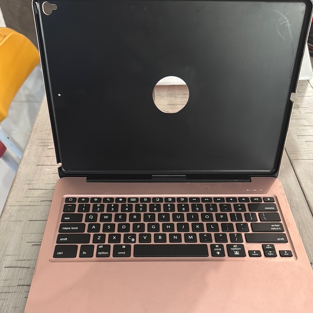 Rose Gold Laptop with Full-Size Keyboard and Thin Bezels